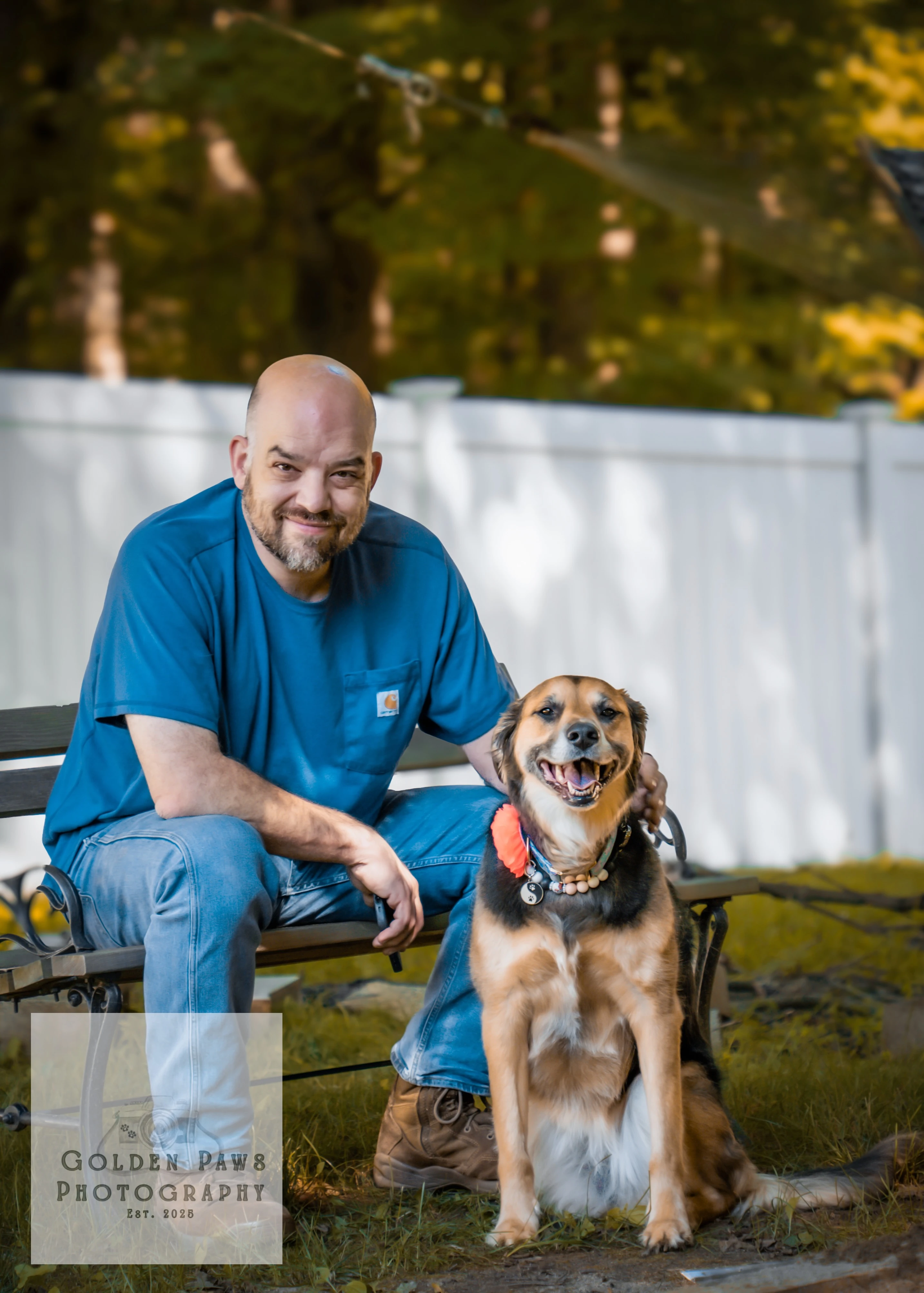 Dog and man sitting at a bench